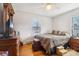 Bedroom with hardwood floor, ceiling fan, and natural light at 1177 Craigbrow Cir, Chester, SC 29706