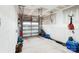 Spacious unfinished garage ready for customization with an automated door and ample storage potential at 1206 Keydet Dr, Charlotte, NC 28216