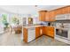 A spacious kitchen and dining area are equipped with modern appliances and natural light at 1305 Glenview Ln, Rock Hill, SC 29730