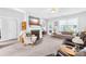 Open-concept living room with fireplace, plush seating, and ample natural light at 1305 Glenview Ln, Rock Hill, SC 29730
