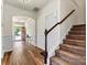 Bright and inviting foyer with hardwood floors and staircase at 142 Wellshire St, Mooresville, NC 28115