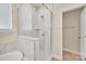 Bright bathroom showcases a marble-tiled glass shower and access to the commode at 1497 Striped Bass Ln, Clover, SC 29710