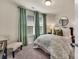 Comfortable bedroom features large windows, stylish decor, and a relaxing atmosphere at 1497 Striped Bass Ln, Clover, SC 29710
