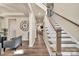 Elegant foyer featuring hardwood floors, stairway, and open layout at 1497 Striped Bass Ln, Clover, SC 29710