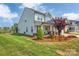 Stylish home with a fenced yard, a covered entrance and attractive landscaping at 1497 Striped Bass Ln, Clover, SC 29710
