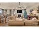 Inviting living room showcasing a fireplace, comfortable seating, and modern décor at 1497 Striped Bass Ln, Clover, SC 29710