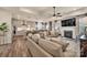 Open-concept living space featuring a modern kitchen, dining area, and a comfortable living room at 1497 Striped Bass Ln, Clover, SC 29710