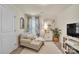 Cozy sitting room featuring a daybed, elegant decor, and ample natural light at 1497 Striped Bass Ln, Clover, SC 29710