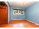 Cozy bedroom with hardwood floors, closet, and natural light at 1509 Wiltshire Rd, Salisbury, NC 21844