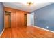 Comfortable bedroom with hardwood floors and a closet offering ample storage space at 1509 Wiltshire Rd, Salisbury, NC 21844