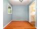 Cozy dining area with hardwood floors and view into adjacent kitchen at 1509 Wiltshire Rd, Salisbury, NC 21844