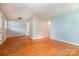 Spacious living room with beautiful hardwood floors and natural light at 1509 Wiltshire Rd, Salisbury, NC 21844