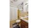 Bathroom featuring a shower-tub combo with a sink and updated flooring at 1975 Peace Rd, Fort Mill, SC 29715