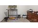 Bedroom featuring a modern computer workstation and dresser with clutter at 1975 Peace Rd, Fort Mill, SC 29715