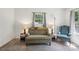 Inviting seating area with ample lighting and decorative side tables, enhancing the cozy and relaxing feel at 1975 Peace Rd, Fort Mill, SC 29715