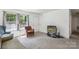 Inviting living room featuring cozy seating, lots of natural light, and neutral decor at 1975 Peace Rd, Fort Mill, SC 29715