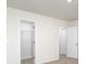 Bright bedroom featuring neutral carpet and two doors at 207 Giant Oak Ave, Statesville, NC 28677