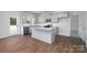 Bright kitchen with stainless appliances, an island, and access to the outdoors at 207 Giant Oak Ave, Statesville, NC 28677