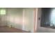 Inviting living space with hardwood floors, features a window with natural light, creating a welcoming atmosphere at 215 S Belvedere Ave, Gastonia, NC 28054