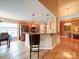 Modern kitchen with granite countertops, stainless steel appliances, and an island with bar seating, perfect for entertaining at 2547 Bill Thompson Rd, Lancaster, SC 29720