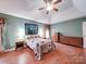 Bedroom with vaulted ceiling, ceiling fan, and wood-look flooring at 2547 Bill Thompson Rd, Lancaster, SC 29720