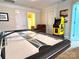 Game room with air hockey table and vintage Pac-Personal arcade game, great for entertaining guests and Gathering fun at 3000 J R Ct, Stanley, NC 28164