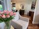 Inviting living room with an accent chair, wooden floors, and bright light fixtures at 3000 J R Ct, Stanley, NC 28164