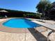 Sparkling in-ground pool featuring a diving board, lounge chairs, and meticulously maintained landscaping for ultimate relaxation at 3000 J R Ct, Stanley, NC 28164
