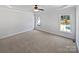 Neutral bedroom with plush carpeting, natural light, and ample space at 3124 Fairmead Dr, Concord, NC 28025