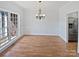 Elegant dining room featuring a modern chandelier and large picture window at 3124 Fairmead Dr, Concord, NC 28025