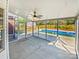 View of the pool from the screened porch with ceiling fan at 3124 Fairmead Dr, Concord, NC 28025