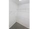 A well-organized walk-in closet featuring wire shelving and neutral paint throughout at 3124 Fairmead Dr, Concord, NC 28025