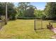 Fenced-in backyard with lush green grass, perfect for outdoor activities and relaxation at 322 S Vine St, Gastonia, NC 28052