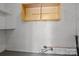 Unfinished basement with shelves and utilities, perfect for storage or future development at 322 S Vine St, Gastonia, NC 28052
