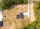 Birds eye view of this home with long driveway, backyard, and green surrounding landscape at 3650 Sentry Rd, Lancaster, SC 29720