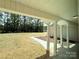 Covered back porch with a view of the expansive backyard at 3650 Sentry Rd, Lancaster, SC 29720