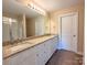 Bathroom featuring double vanity sinks with granite countertops at 3650 Sentry Rd, Lancaster, SC 29720