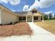 Inviting exterior featuring a covered porch, well-manicured landscaping, and a welcoming walkway at 3650 Sentry Rd, Lancaster, SC 29720
