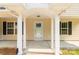 Inviting front entrance with white columns and a covered porch area at 3650 Sentry Rd, Lancaster, SC 29720