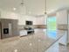 Modern kitchen with stainless steel appliances, granite countertops, and white cabinets at 3650 Sentry Rd, Lancaster, SC 29720
