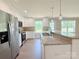 Modern kitchen with stainless steel appliances, granite countertops, and ample cabinet space at 3650 Sentry Rd, Lancaster, SC 29720