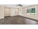 Spacious living room with plenty of natural light and a ceiling fan at 3650 Sentry Rd, Lancaster, SC 29720