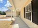 Covered porch featuring large windows, providing natural light and curb appeal at 3650 Sentry Rd, Lancaster, SC 29720