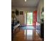 Bright foyer with hardwood floors, a red front door and decorative accents at 414 Fulton Dr, Kings Mountain, NC 28086