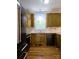 Well-equipped kitchen features stainless appliances, granite counters, tile backsplash and attractive cabinetry at 414 Fulton Dr, Kings Mountain, NC 28086