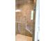 Shower features neutral tile and a glass door at 414 Fulton Dr, Kings Mountain, NC 28086