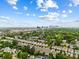 A beautiful aerial view of a neighborhood with city skyline in the distance at 432 Belton St, Charlotte, NC 28209