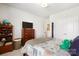 Inviting bedroom with a wood dresser and bookcase, complementing the cozy atmosphere at 432 Belton St, Charlotte, NC 28209