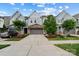 Charming townhome showcases a stone-accented facade and a well-maintained front yard at 432 Belton St, Charlotte, NC 28209