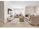 Relaxing living room with neutral decor, plush seating, and lots of natural light at 432 Belton St, Charlotte, NC 28209